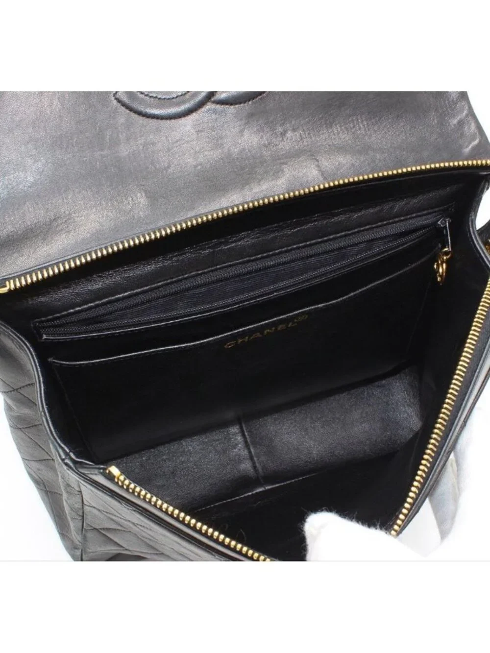 Chanel Quilted Leather Backpack